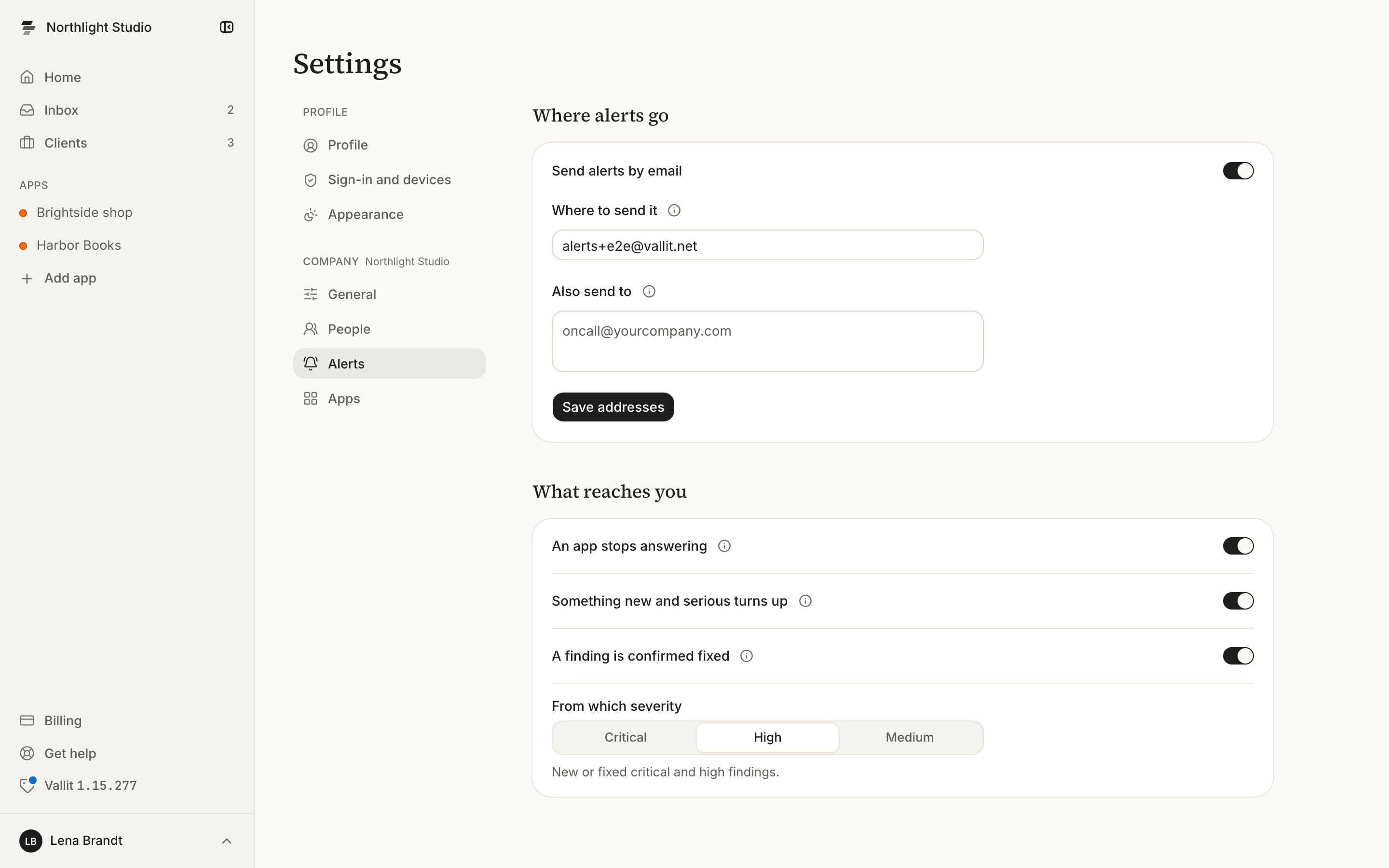 The Alerts section of the company settings with the Where alerts go card ringed: the Send alerts by email switch, the address fields and Save addresses. The What reaches you card with its three switches follows it.